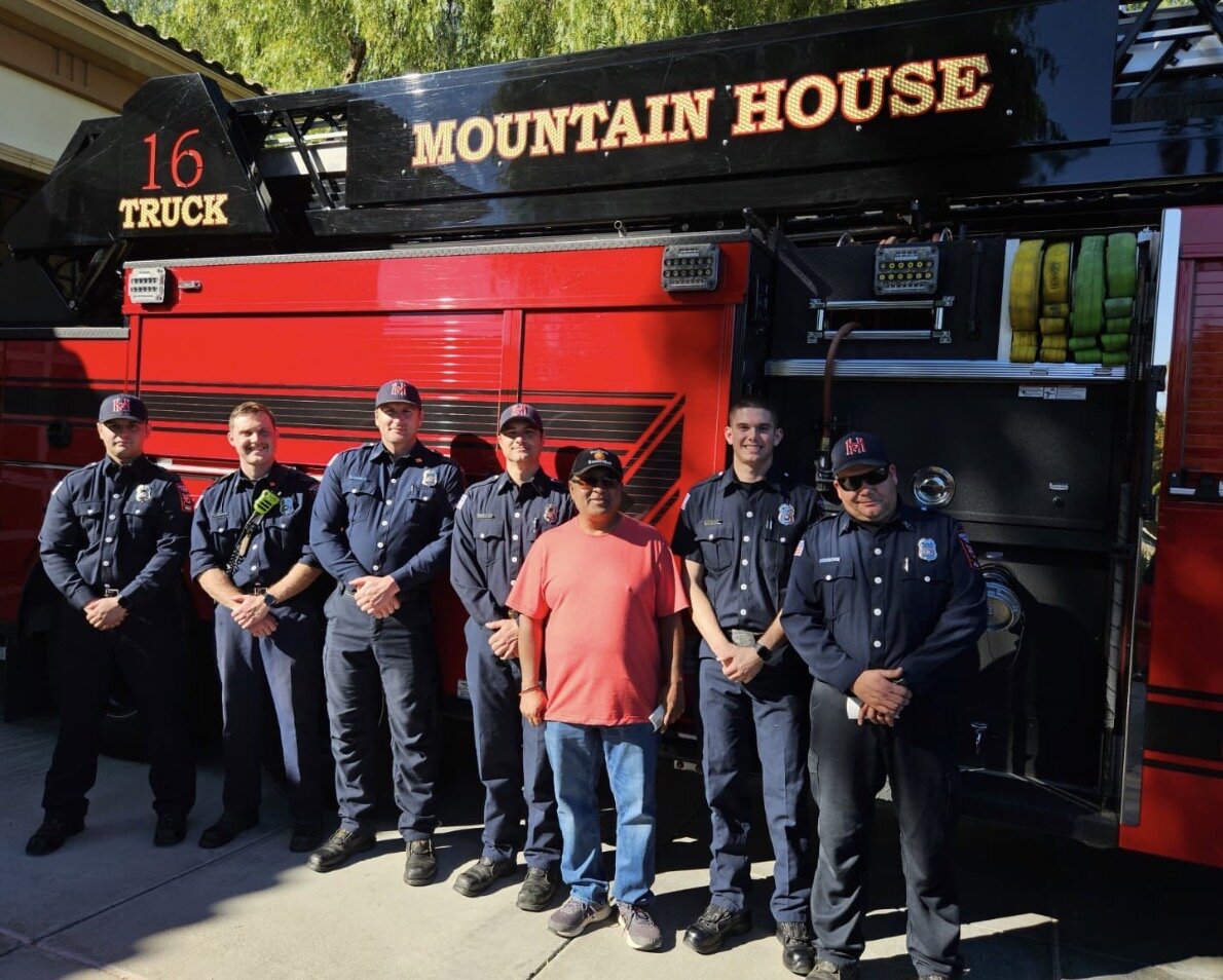 Healthy Hoopers players visiting the Mountain House Fire Department with firefighters